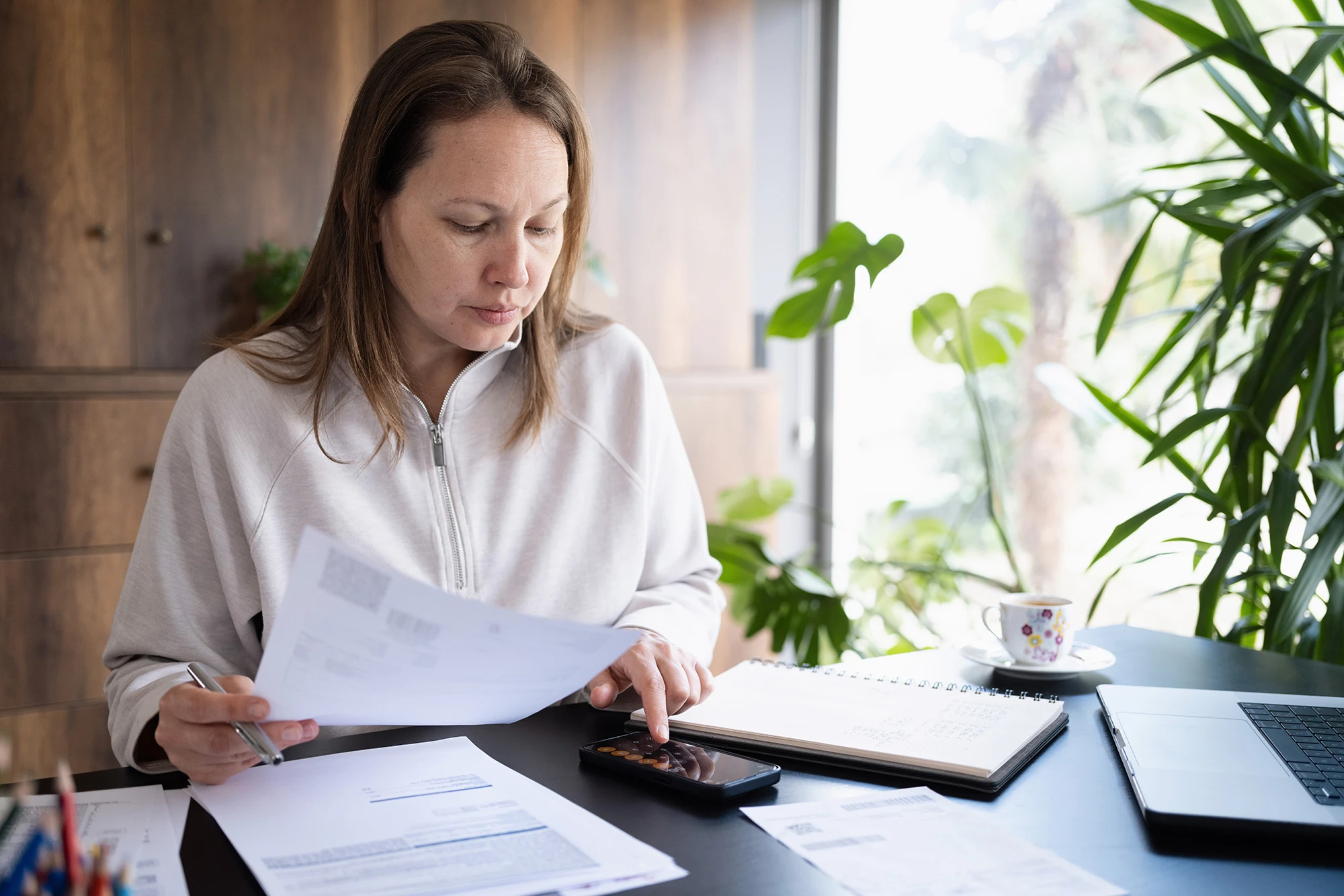 Woman Reviewing Finances Woman reviewing finances